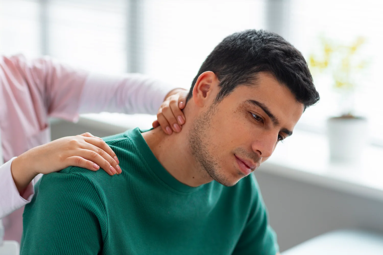 Delayed whiplash symptoms causing neck pain after a car accident